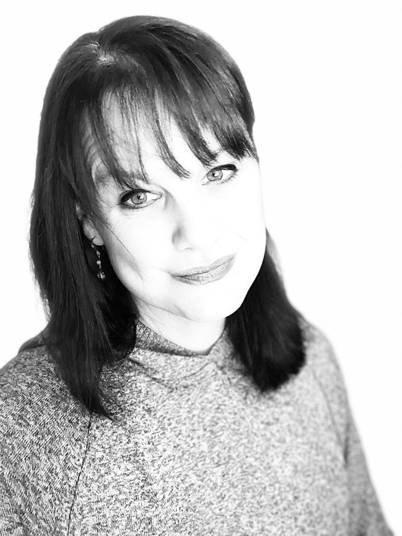 Close-up portrait of Jenny Ferran, smiling